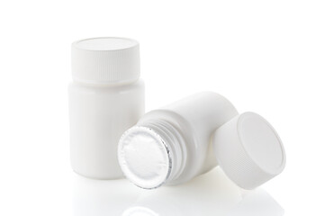 White jar with medicine isolation on white background. Plastic bottle for medicine, powder, pills, tabs, capsules. Close-up