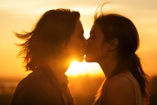 Two women, lesbian couple kissing at sunset, closeup detail to faces, orange sky behind them. Happy candid romantic moment - LBGT concept. Generative AI