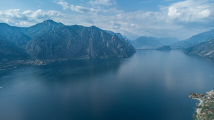 Naklejka na ściany i meble Lago de Garda. Drone areal view. Mountains and lake nature view.