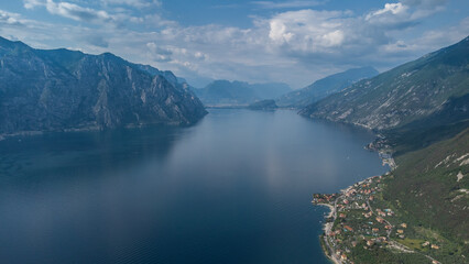 Naklejka na ściany i meble Lago de Garda. Drone areal view. Mountains and lake nature view.