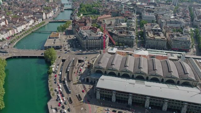 Aerial view of Swiss City of Z&uuml;rich with Swiss National Museum, Limmat River and Platzspitz Park on a hot and sunny summer day. Movie shot July 18th, 2023, Zurich, Switzerland.