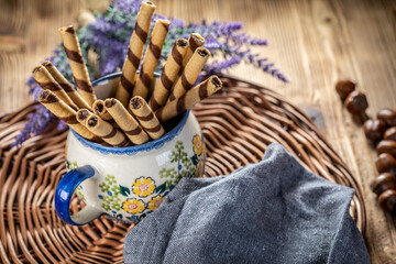 Sweet spiral tubes with nuts cream.