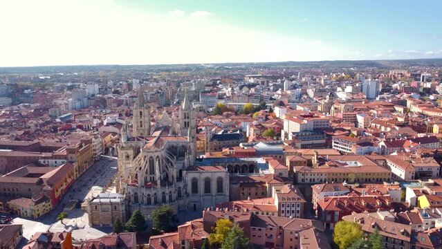Beautiful city of LEON - Spain, with his spectacular Cathedral,  a gothic style building. Drone tracking left. Panoramic view of the city. Travel destination north-west of Spain.