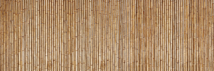 horizontal dry bamboo fence texture for pattern and background.