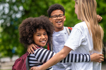 Friends feeling good together and hugging