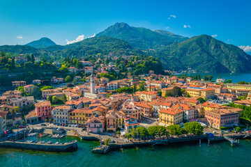 Fototapeta na wymiar Menaggio, Como Lake. Aerial panoramic view Menaggio town surrounded by mountains and located in Como Lake, Lombardy, Italy