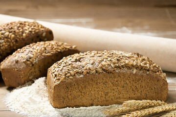 Fresh dark bread. Rye bread on the board