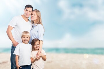 Family travel on a beach with children on vacation