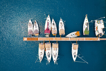 Drone view of boats on pier
