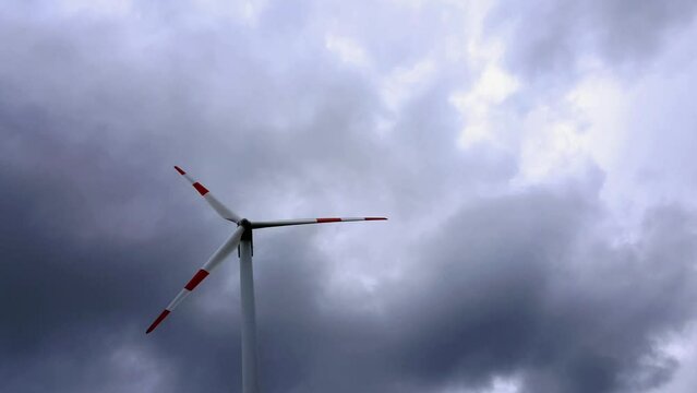 Wind turbines generate electricity when the wind is strong and the sky is very cloudy. Special Effect Time Lapse Timelapse