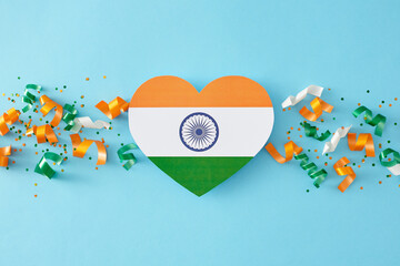 Happy India Independence Day. Top view flat lay of heart-shaped indian flag, patriotic confetti on...