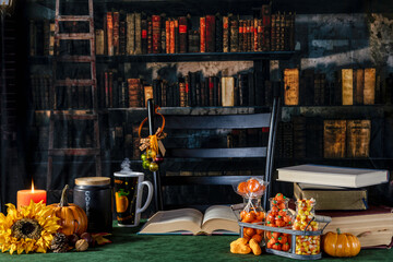 Halloween candy and fall decorations in retro looking library