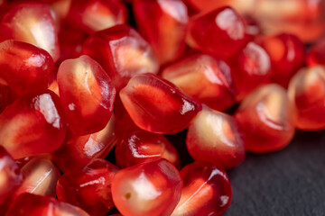 Delicious ripe red pomegranate with red and juicy grains