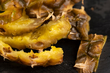 green-yellow peel of ripe pineapple close-up
