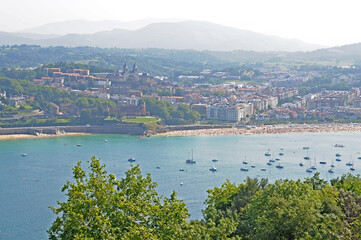 Fototapeta na wymiar View over the city, beach, mountains and sea in San Sebastian or Donostia, Spanish Basque Country, Europe on a summer day