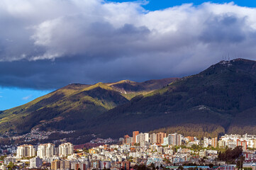 Cityscape of Quito city skyline with Pichincha volcano, Ecuador.