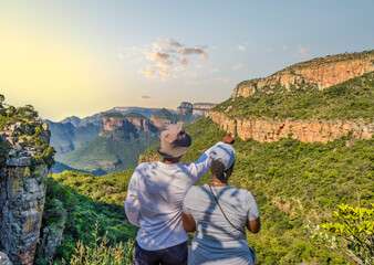 Young tourists are enjoying the view at Blyde River Canyon, Panorama Route, Graskop, Mpumalanga,...