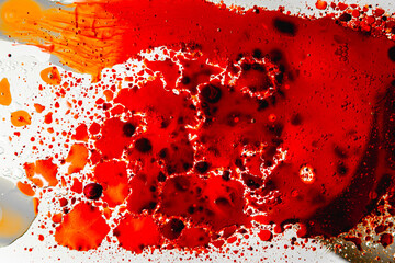 splash liquid vibrant shapes red orange and black 