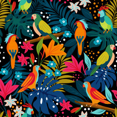 Seamless pattern of parrots on the tropical branches with tropical leaves