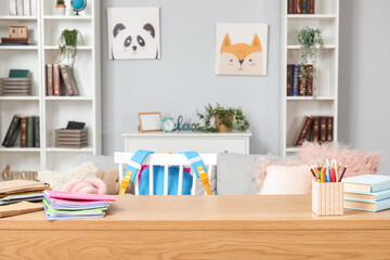 School stationery on table in room