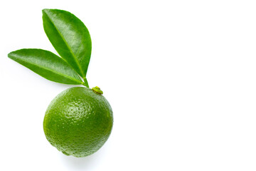Limes with leaf isolated on white