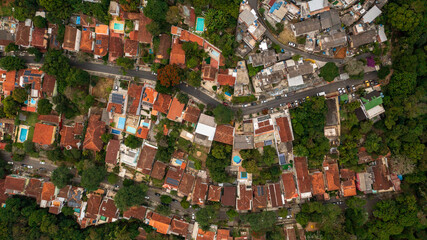 Aerial view of streets in the North Zone of Rio de Janeiro. Contrast of house, buildings and trees that make up the landscape of the wonderful city.
