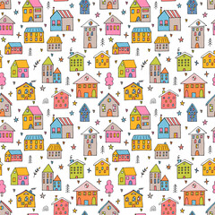 Cute seamless pattern with hand drawn houses. Buildings. Doodle style. Texture for fabric, wrapping, wallpaper, textile