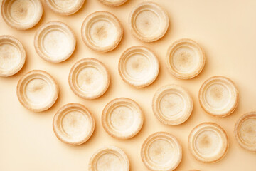 Homemade tartlets on yellow background