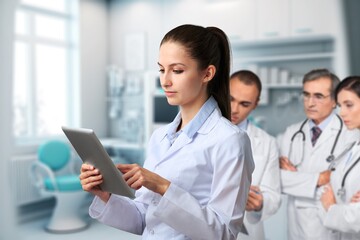Young healthcare doctor hold digital tablet for research