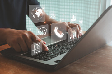 Businessman hand pointing finger and reach out for contact for customer service or purchase order from online shopping. Global marketing allow business to connect with insight target customer data.