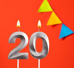 Birthday candle number 20 - Invitation card in orange background