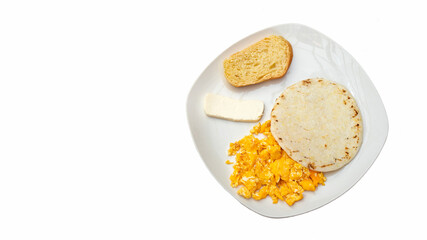 Arepa with cheese, egg and bread - Traditional Colombian breakfast