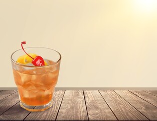 Fresh cold alcohol drink in glass on desk