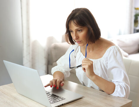 woman working at home on laptop