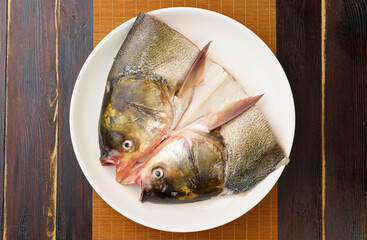 Fresh chub head on chinese style background