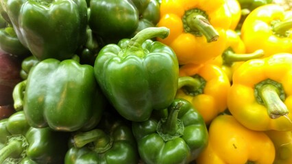 Fototapeta na wymiar yellow and green peppers