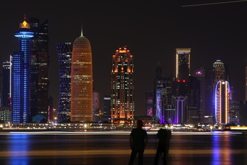 View of doha corniche during night along with fanar building.
