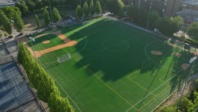 Drone shot of a multipurpose playfield in Seattle at sunrise.