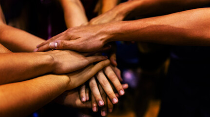Obraz na płótnie Canvas Sports team showing unity with their hands together