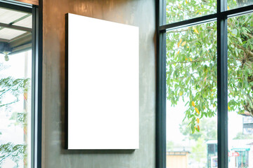 Mockup image of Blank billboard white screen posters for advertising, Blank photo frames display in coffee shop for your design - Powered by Adobe