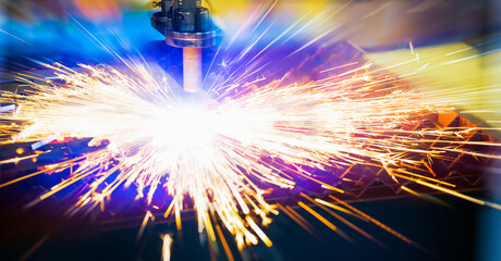 Laser cutting of metal with sparks