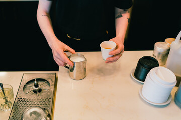 Latte art being poured