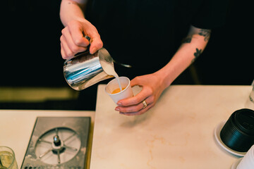 Latte art being poured