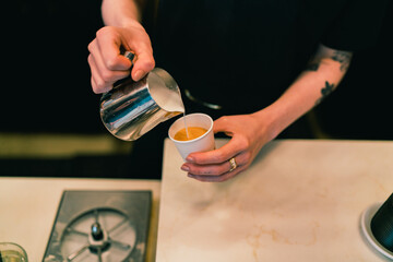 Latte art being poured