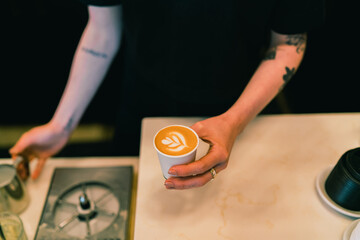 Latte art being poured