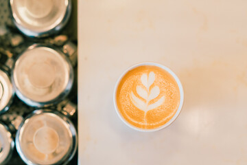 Latte on table paper cup