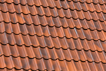 Red tiles roof background