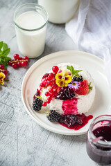 goat cheese with fresh berries and flowers