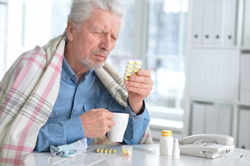 Close up portrait of sick senior man