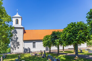 Fototapeta na wymiar Church with cemetery in the Swedish countryside